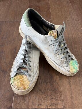 White P448 Sneakers with Iridescent Green-Gold Toe Accents. Size 40.